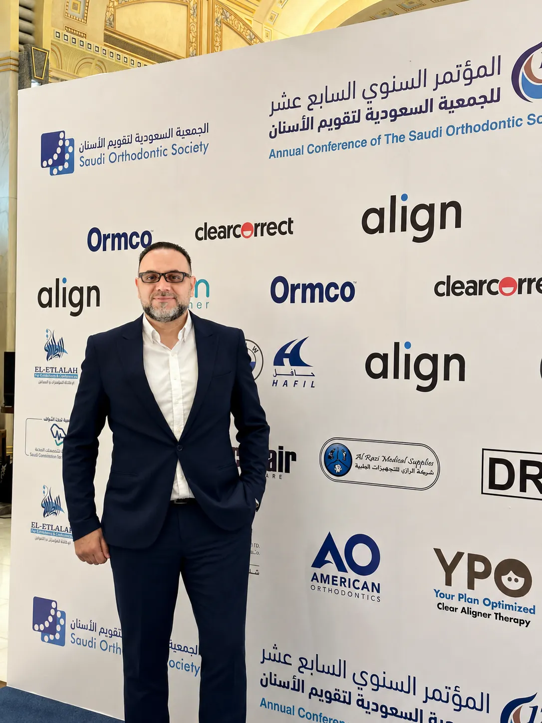 Dr. Diaa Eldin Altaweel reviewing an orthodontic treatment plan